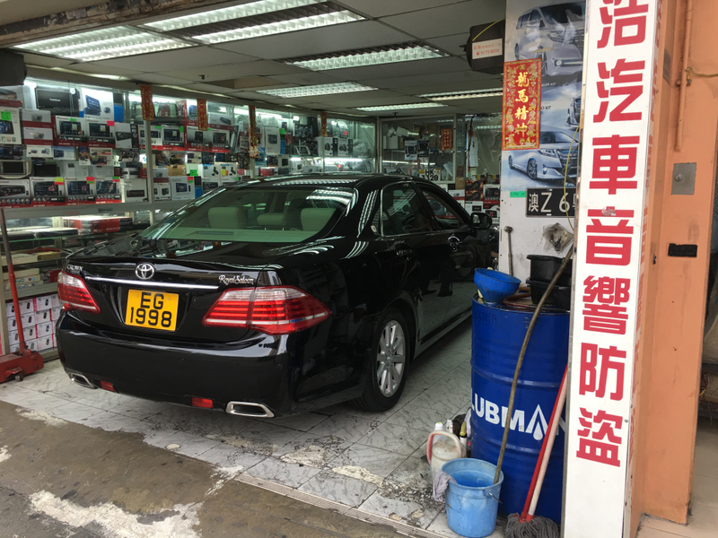 Nice Toyota Crown hanging out at a local stereo shop.